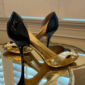 Giuseppe Zanotti heels. Black, gold, and rose gold patent leather.
